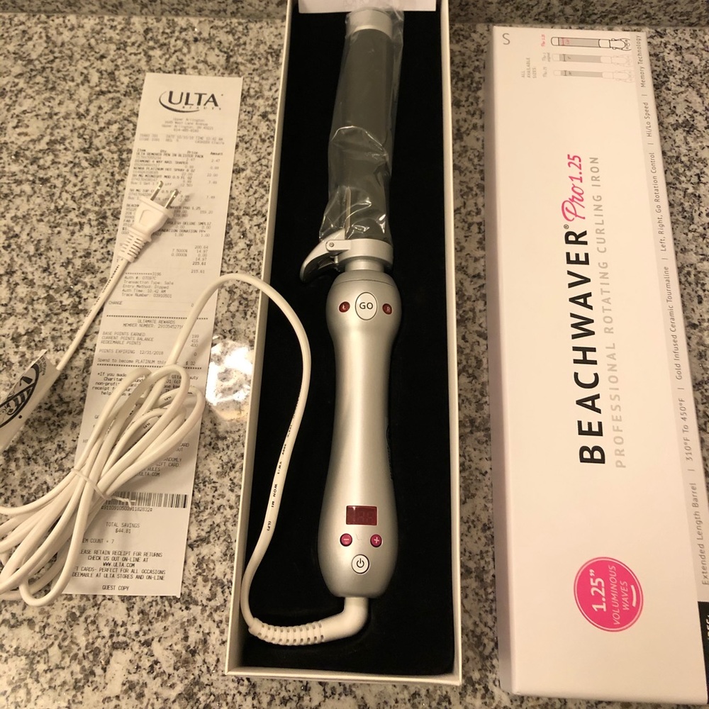 Rotating curling iron